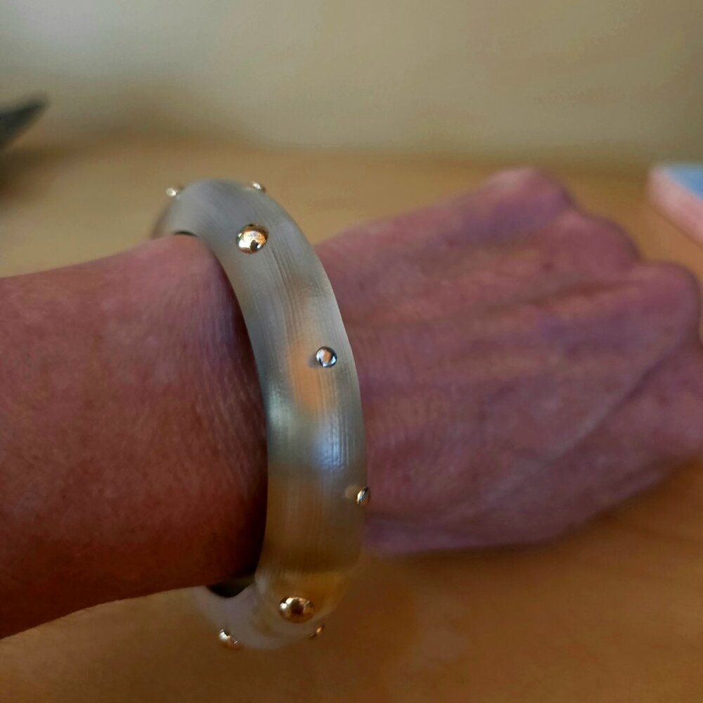 Alexis Bittar Rocky gold clear lucite bangle bracelet with silver & gold circles